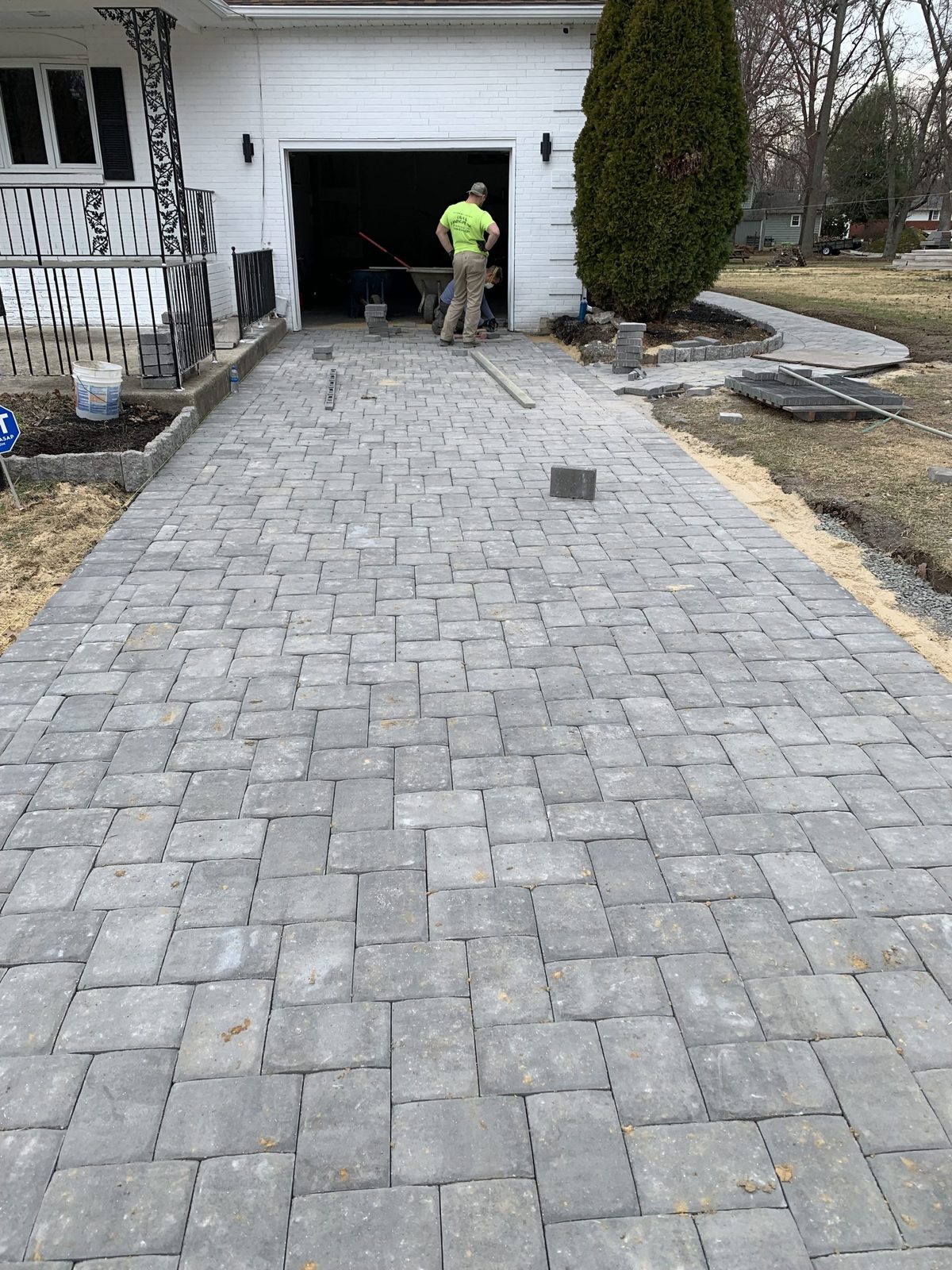 Curved paver patio and walkway installation