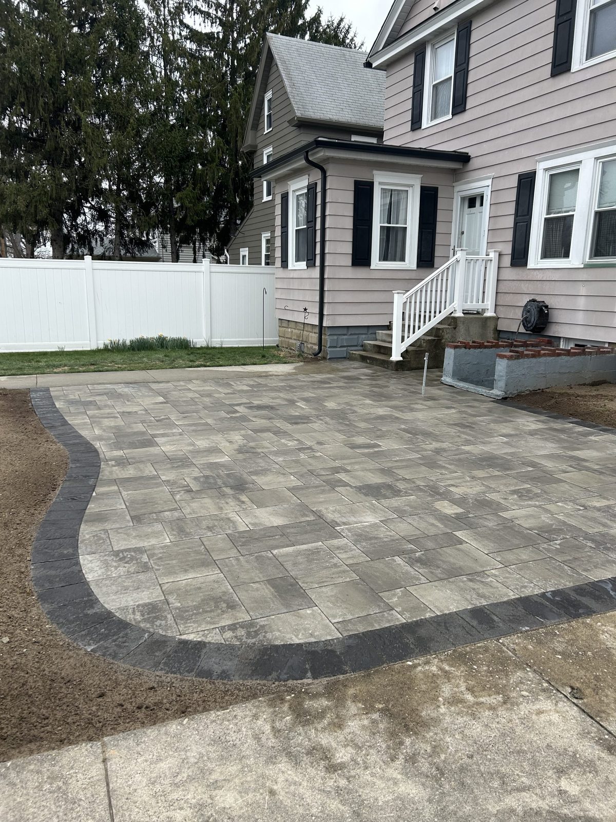 Paver driveway and front-yard landscaping