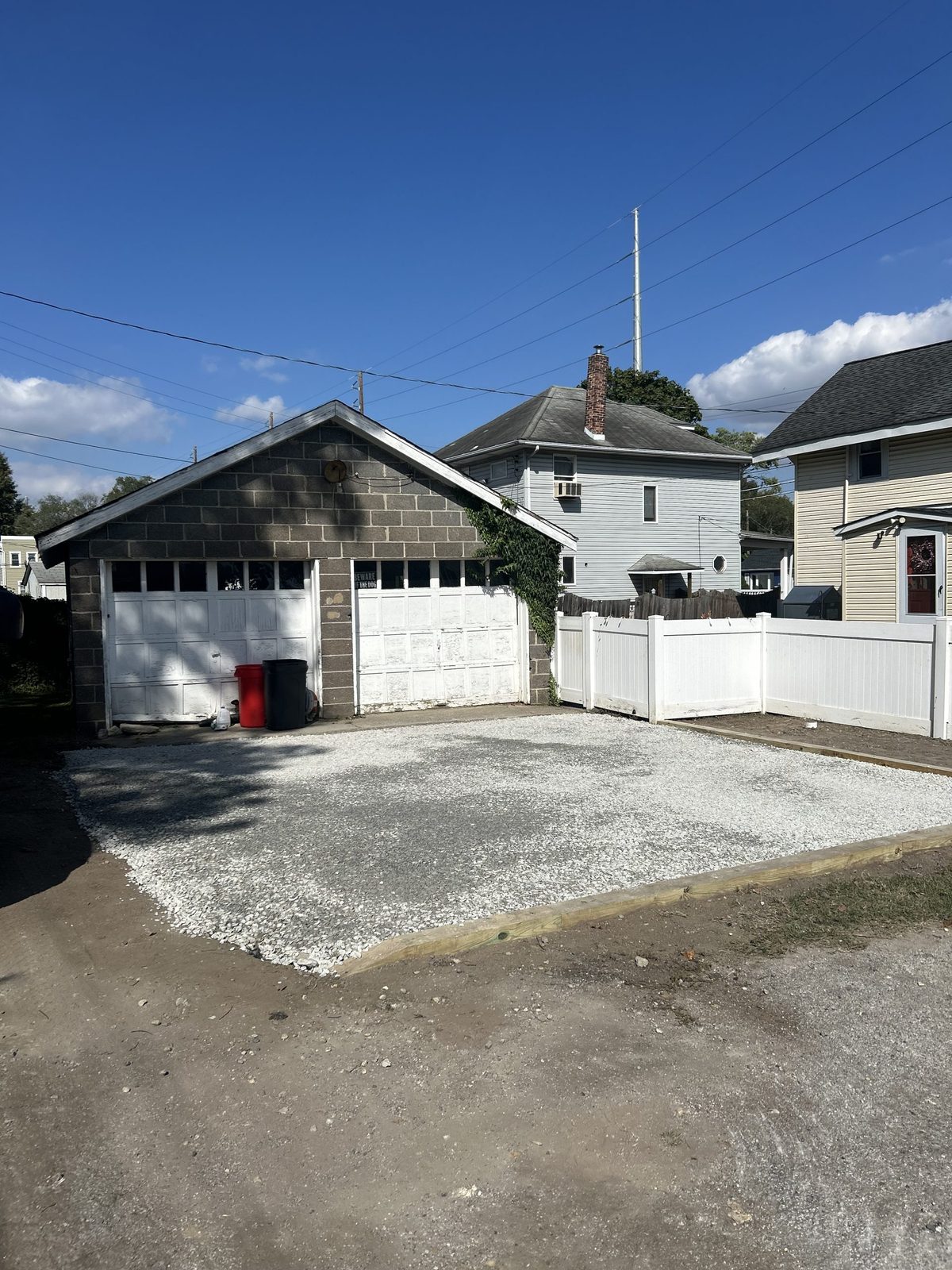 Paver walkway leading to a home entrance